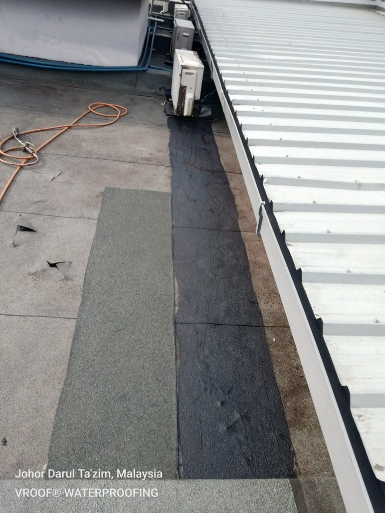 Bitumen applied along the metal deck runoff area at Cascadia as part of the membrane repair preparation.